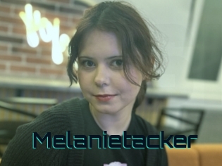 Melanietacker